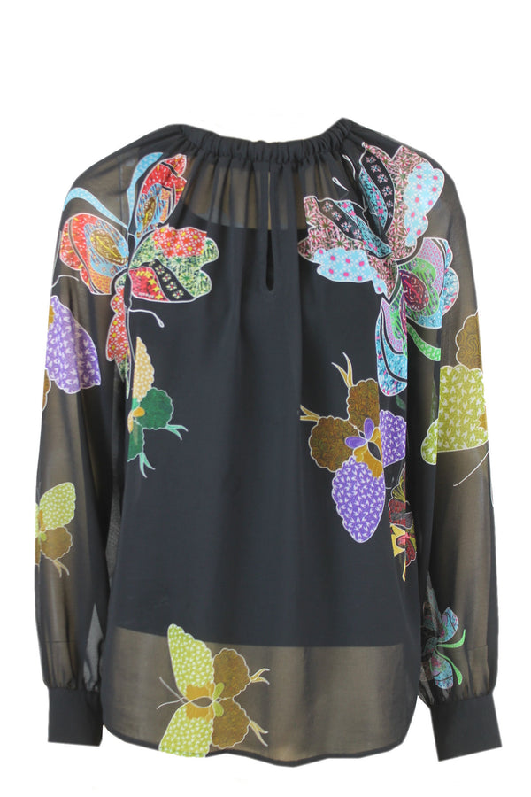 Caroline Biss transparante blouse.