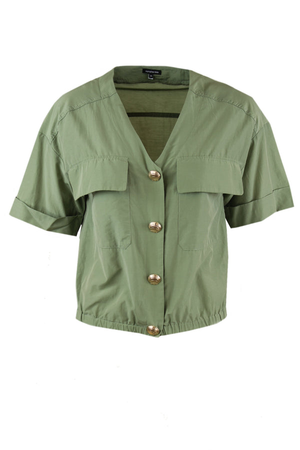 Caroline Biss blouse met luxe goudkleurige drukknopen.