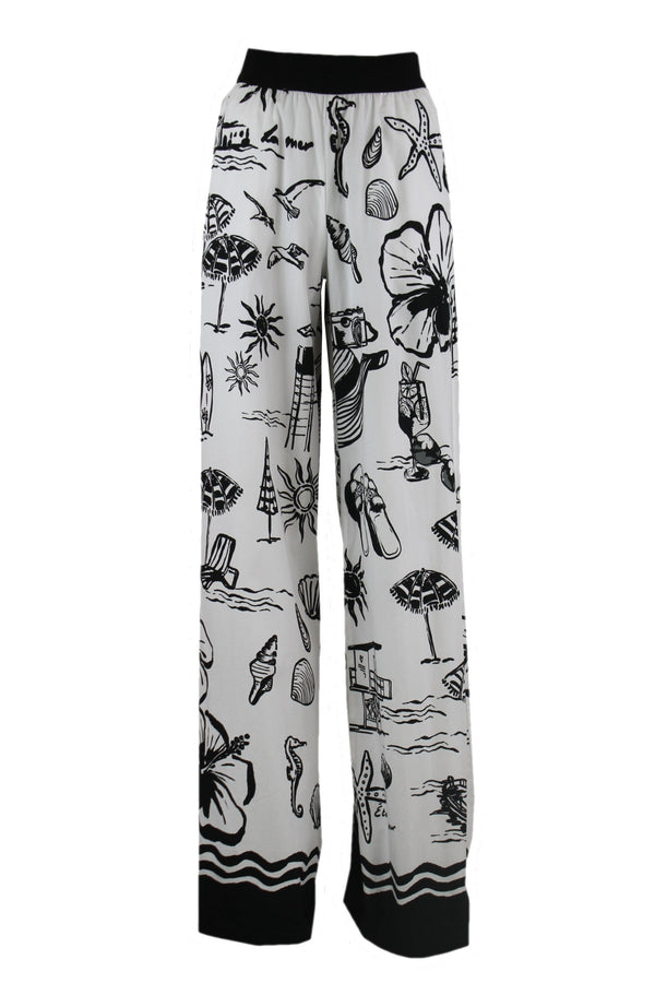 Caroline Biss witte broek met een zwarte print.