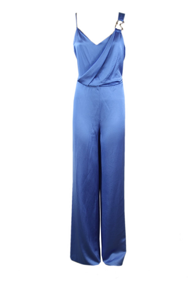 Caroline Biss jumpsuit van glanzend materiaal.