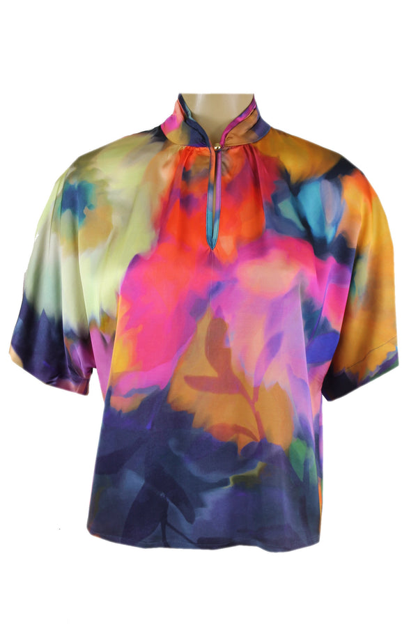 Caroline Biss blouse met aangeknipte mouwen.