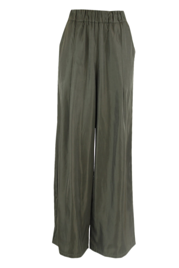 Caroline Biss broek van glanzend materiaal.