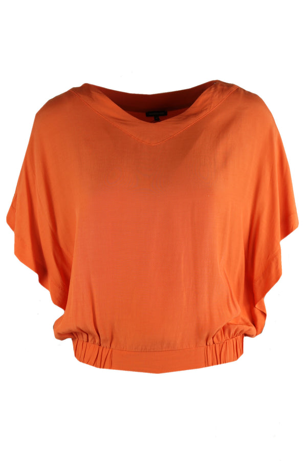 Caroline Biss oranje blouse met elastische zijkanten.