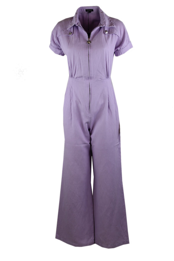 Caroline Biss jumpsuit met een zilverkleurige rits.